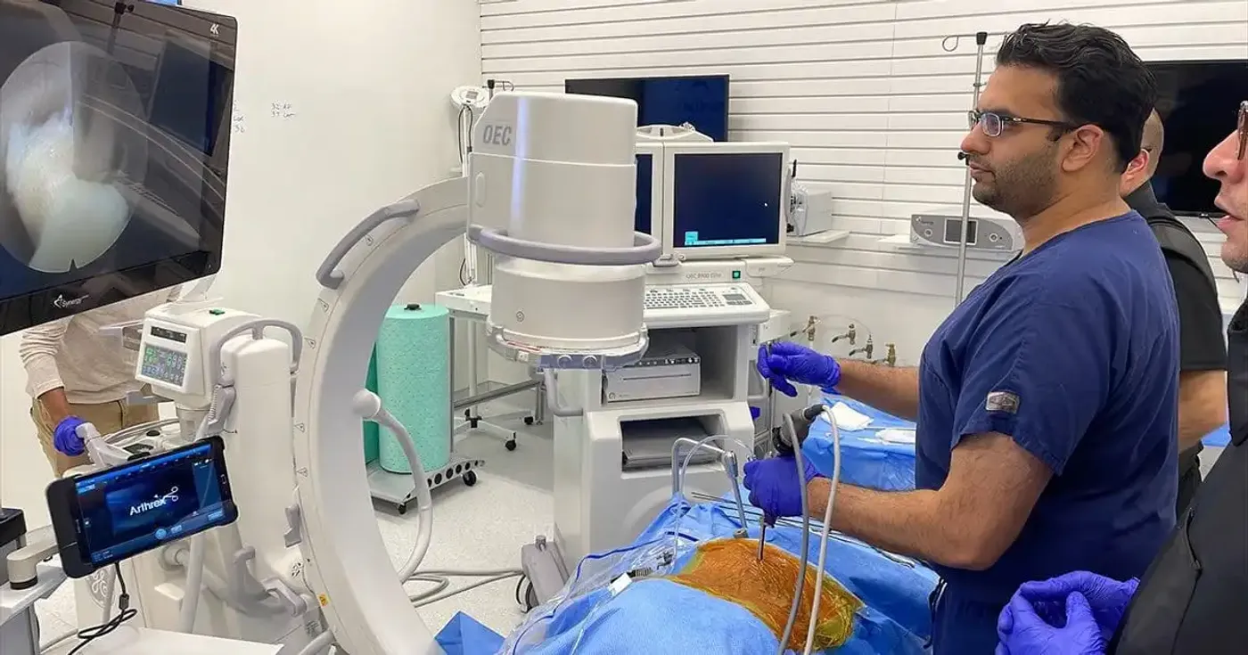 Dr. Nitin Agarwal demonstrating spine endoscopy techniques at UPMC's teaching laboratory