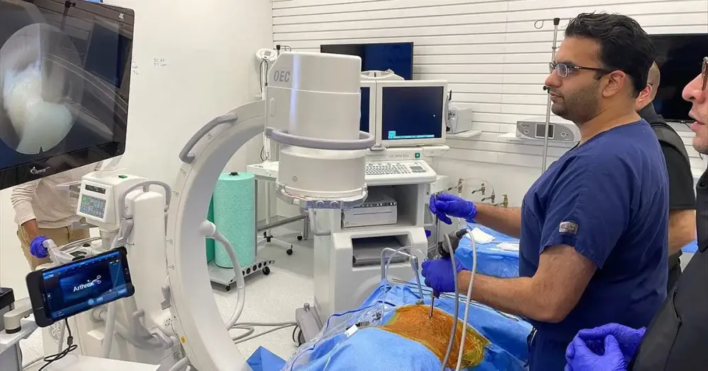 Dr. Nitin Agarwal demonstrating spine endoscopy techniques at UPMC's teaching laboratory